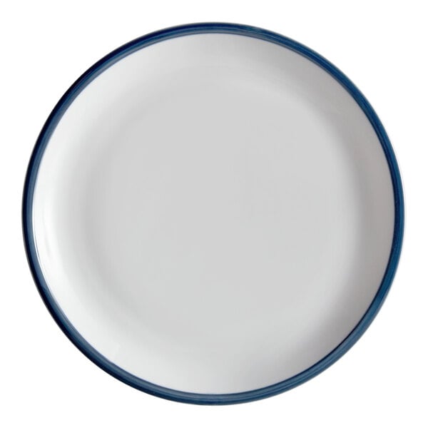 A white Libbey porcelain plate with a steel blue rim.