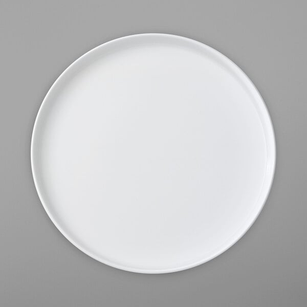 A white Villeroy & Boch round porcelain platter with a rim.