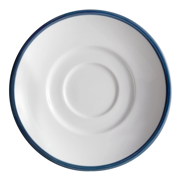 A close-up of a Libbey white porcelain saucer with a steel blue rim.