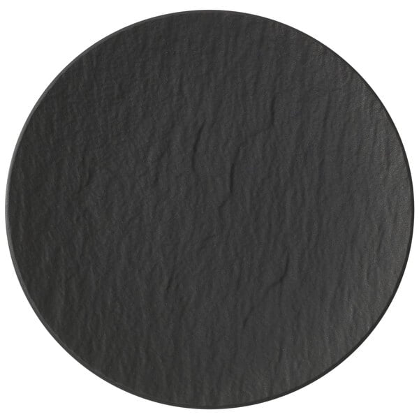 A close-up of a Villeroy & Boch black shale coupe plate.