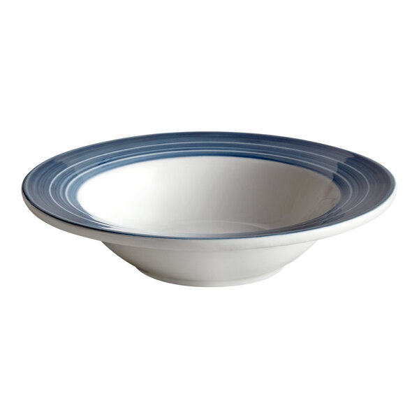 A white porcelain Libbey grapefruit bowl with blue stripes.