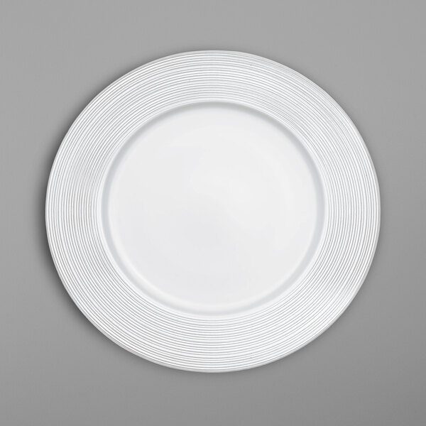 a white plate with a circular pattern