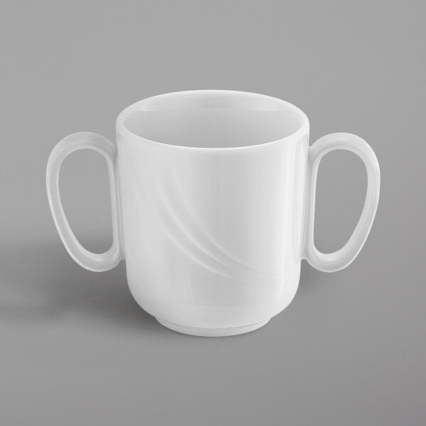 A white Schonwald porcelain mug with two handles.