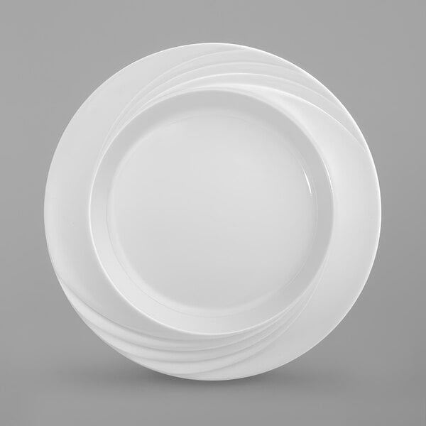 A white Schonwald Donna Senior porcelain plate with a curved special rim.