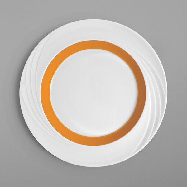 A white Schonwald porcelain plate with an orange rim.