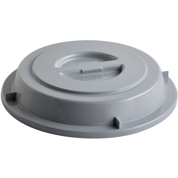 A grey plastic Schonwald plate cover with a circular hole.