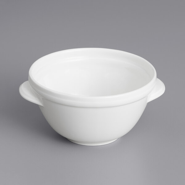 A close up of a Villeroy & Boch white bowl with a handle.
