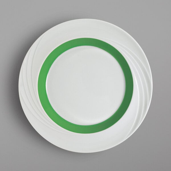 A white plate with a green rim.