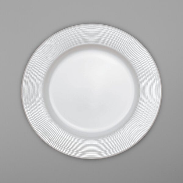 a white plate with a circular pattern