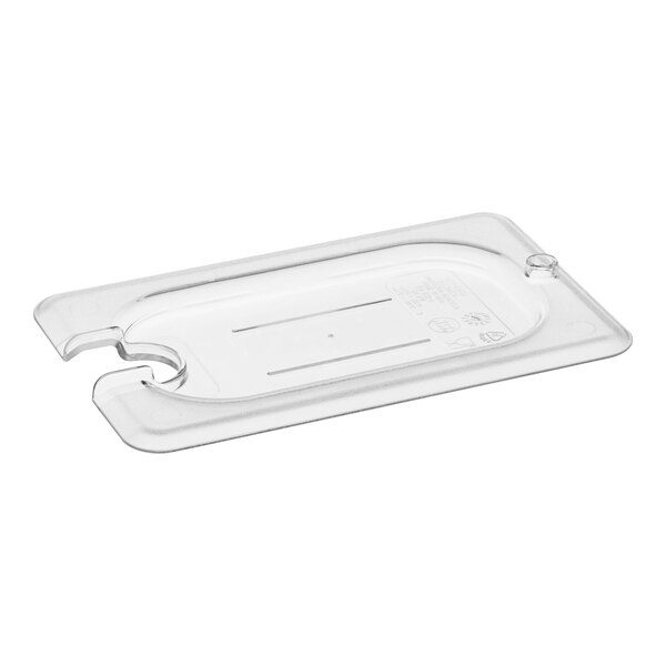 A clear plastic Cambro lid for a white food container with a spoon notch.