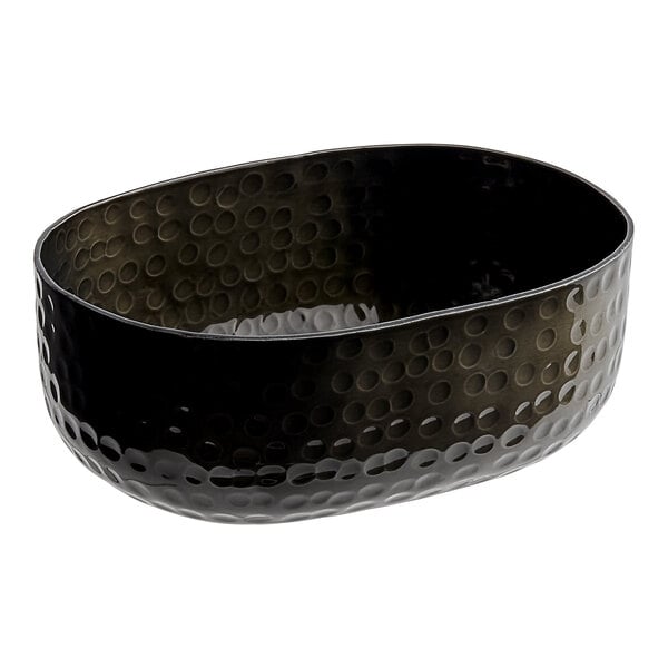 An American Metalcraft black hammered aluminum oval serving bowl with a textured surface.