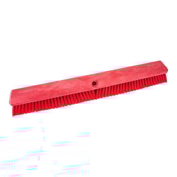 A red Carlisle Sparta Omni push broom head.