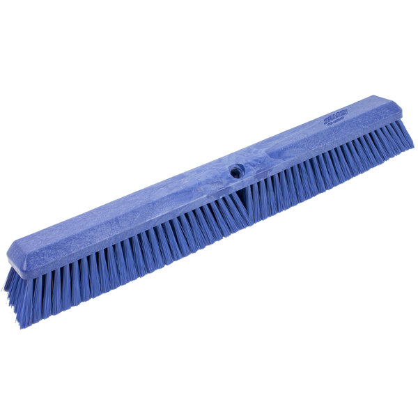 A blue Carlisle Sparta Omni Sweep push broom head with long bristles.