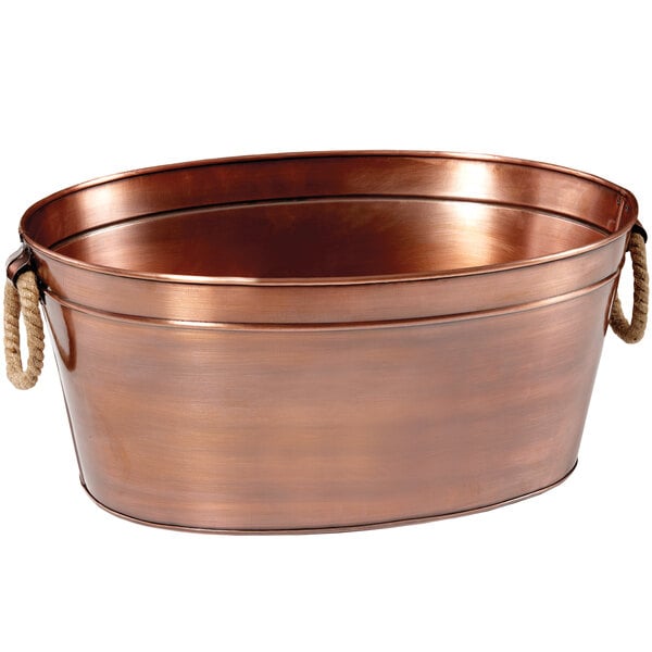 A copper beverage tub with rope handles.