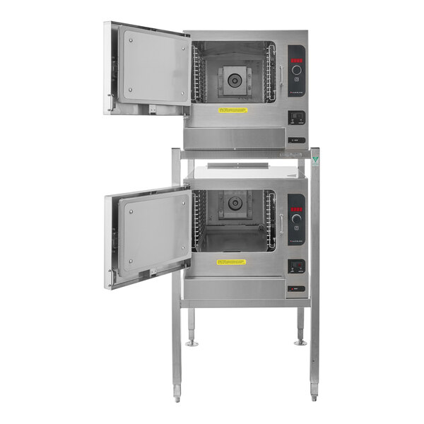 A close-up of two Cleveland SteamChef ovens with open doors.