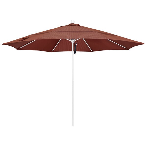 A brown California Umbrella ALTO round umbrella with a white pole and Terrace Adobe fabric.