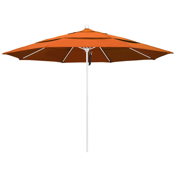 an orange umbrella with a white pole