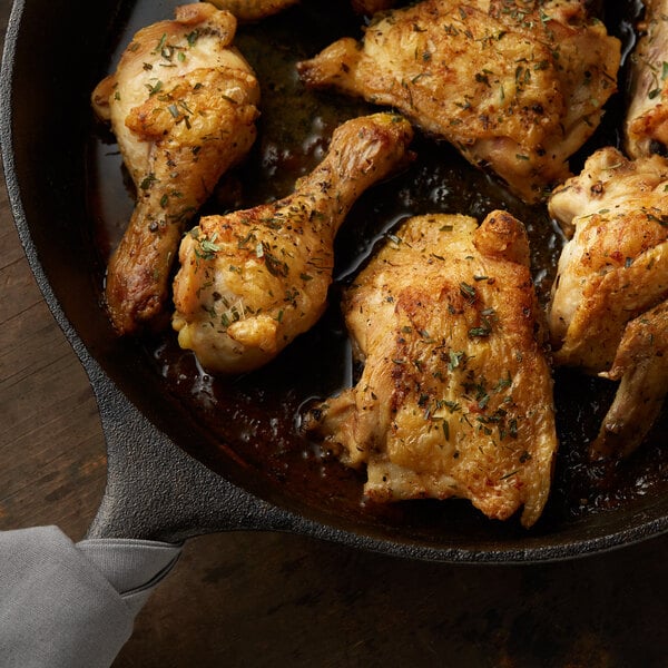 A pan of chicken with Regal Tarragon Leaves seasoning.