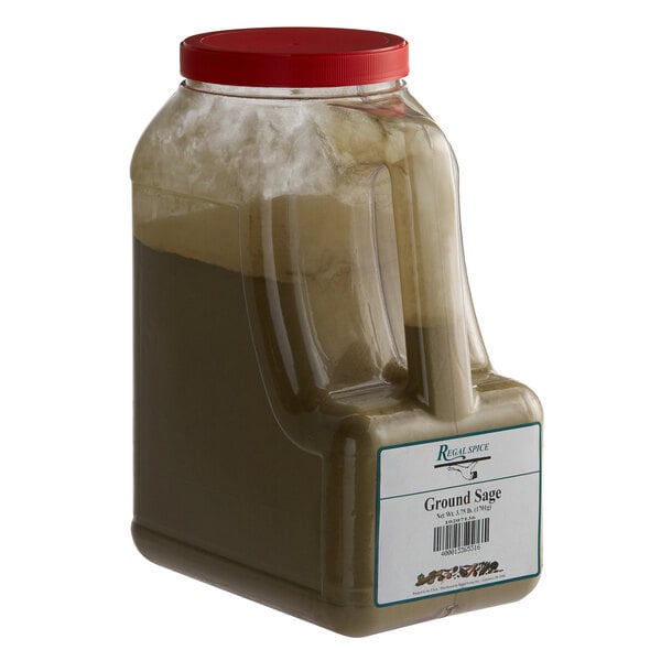 A plastic container of ground sage with a red lid.