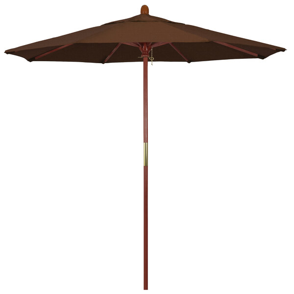 A brown California Umbrella with a teak pole.