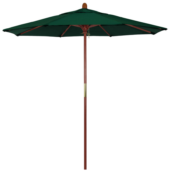 A green umbrella with a wooden pole.