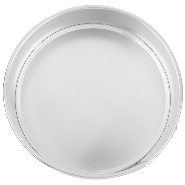 A round silver Chicago Metallic springform cake pan.