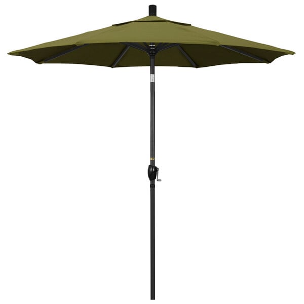A green California Umbrella on a black pole.