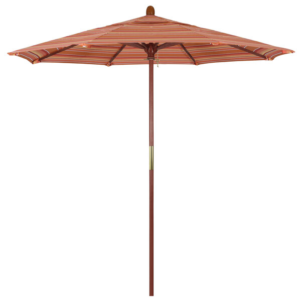 The California Umbrella Grove round outdoor umbrella with a striped Sunbrella canopy on a hardwood pole.