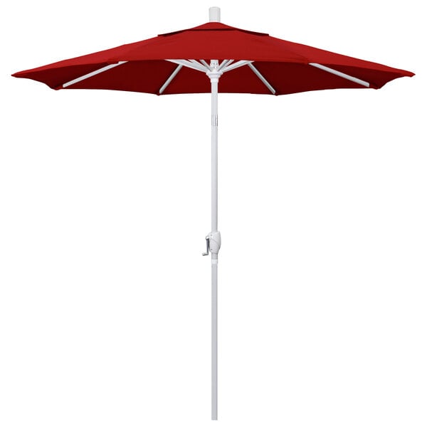 A red California Umbrella on a white pole.