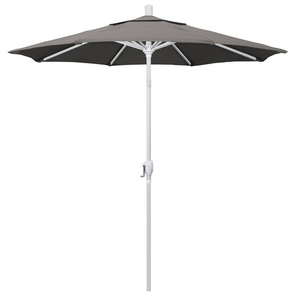 A black umbrella with a white pole and taupe fabric.