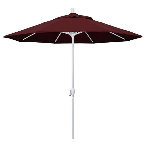 A close-up of a burgundy California Umbrella with a white pole.