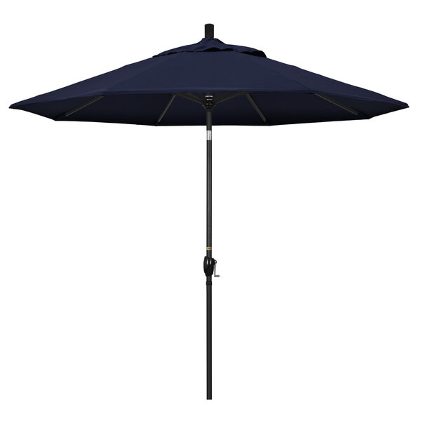 A navy blue California Umbrella with a stone black pole.