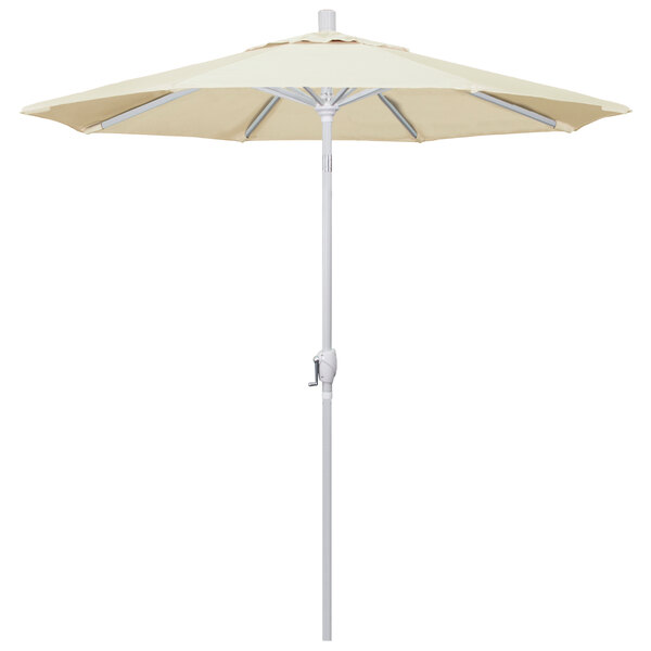 A white California Umbrella with a beige canvas shade.