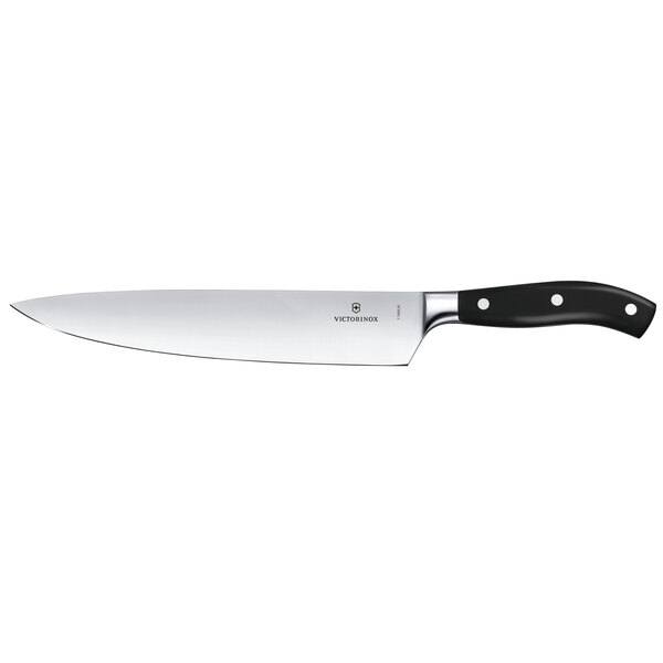 A Victorinox Grand Maitre chef knife with a black handle.