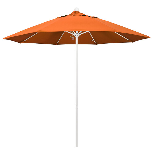 An orange California Umbrella with a Sunbrella Tuscan canopy on a white pole.