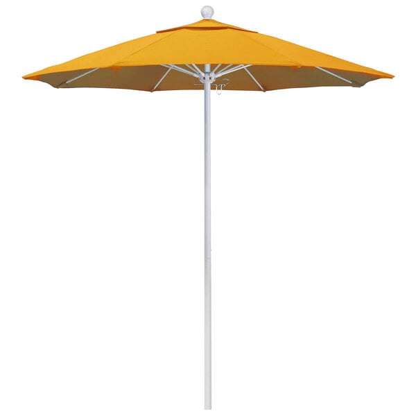 A close-up of a yellow California Umbrella on a white pole.