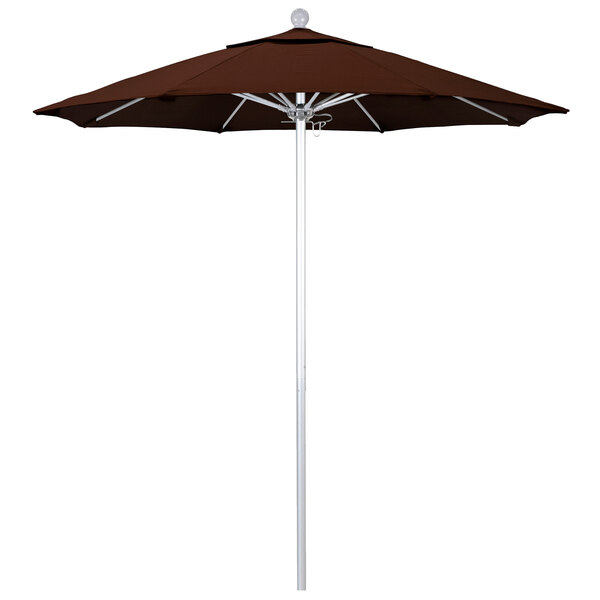 A brown California Umbrella with a Sunbrella canopy on a white pole.