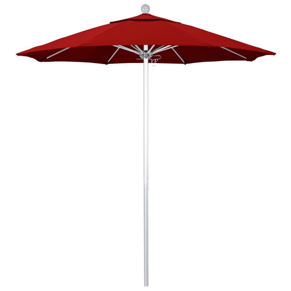 A close-up of a red California Umbrella with a white pole.