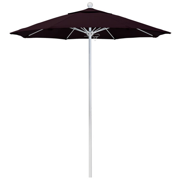 A black California Umbrella with a white pole.