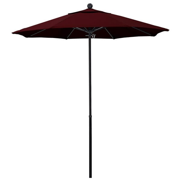 A close-up of a burgundy California Umbrella with a Pacifica canopy.