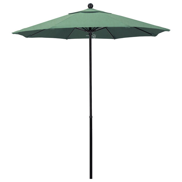 A Pacifica Canopy spa fabric umbrella with a green canopy on a black pole.