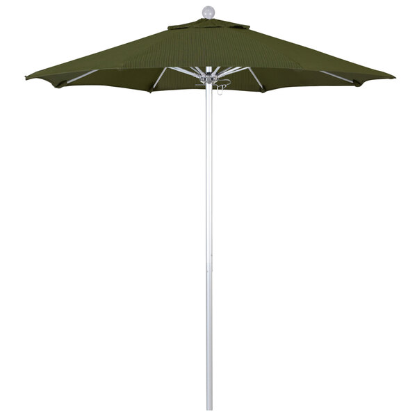 A green California Umbrella on a silver pole.