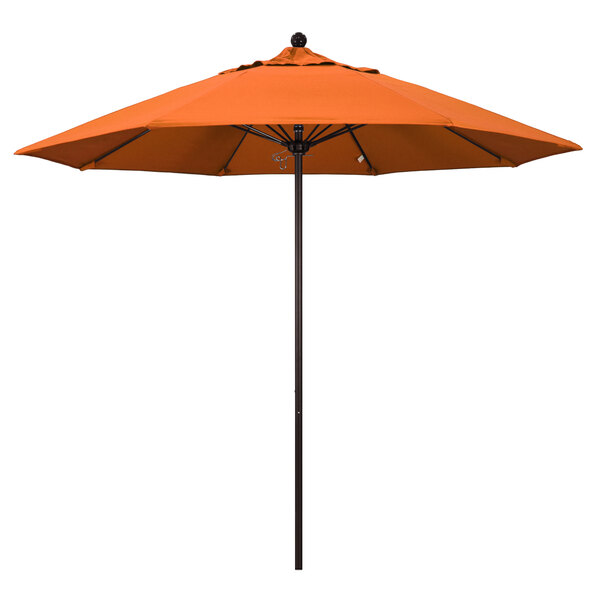 A California Umbrella ALTO round orange umbrella with a bronze pole.