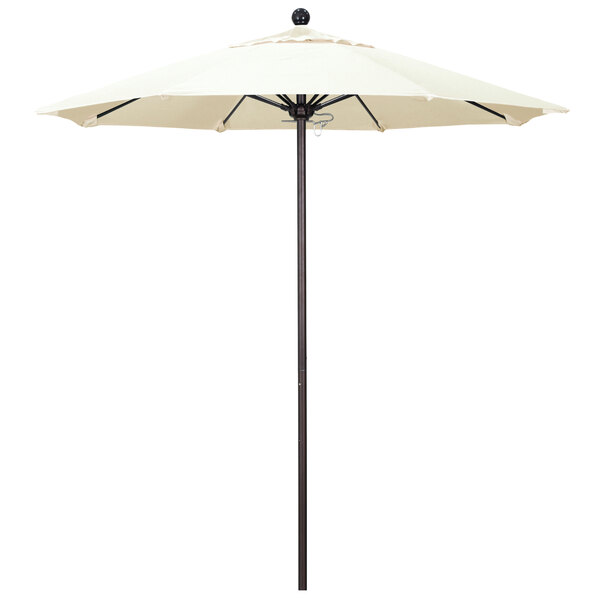 A California Umbrella ALTO round umbrella with a Pacifica canopy on a bronze pole.