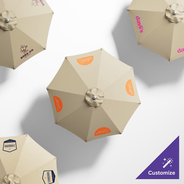 A customizable California Umbrella with an Antique Beige Sunbrella canopy and silver pole.