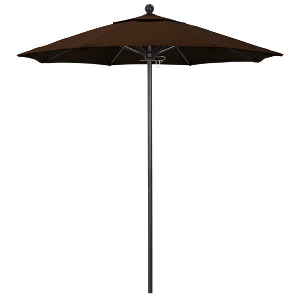 A close-up of a brown California Umbrella with a Pacifica canopy on a bronze pole.