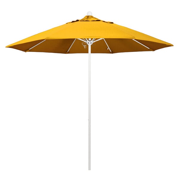 A close-up of a yellow California Umbrella on a white pole.