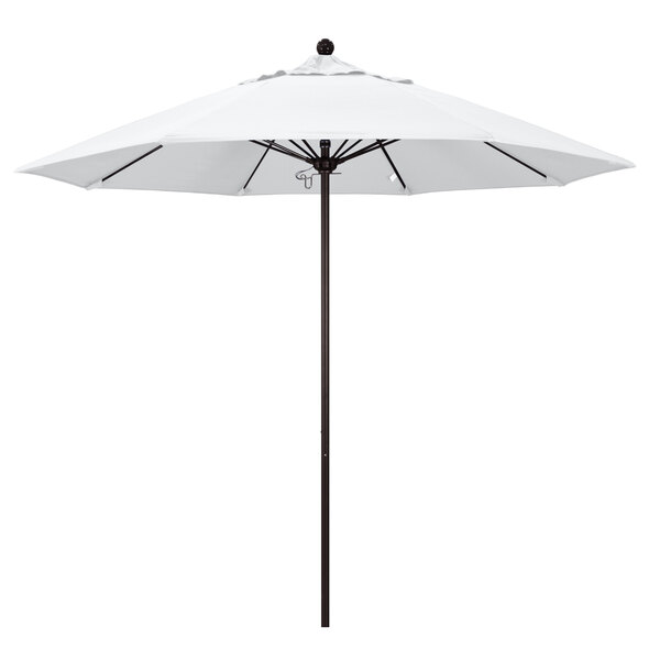 A white California Umbrella with a bronze pole.