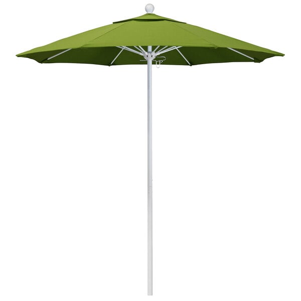 A green California Umbrella with a white pole.