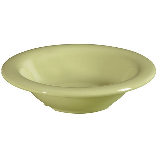 A white melamine bowl with a green rim.